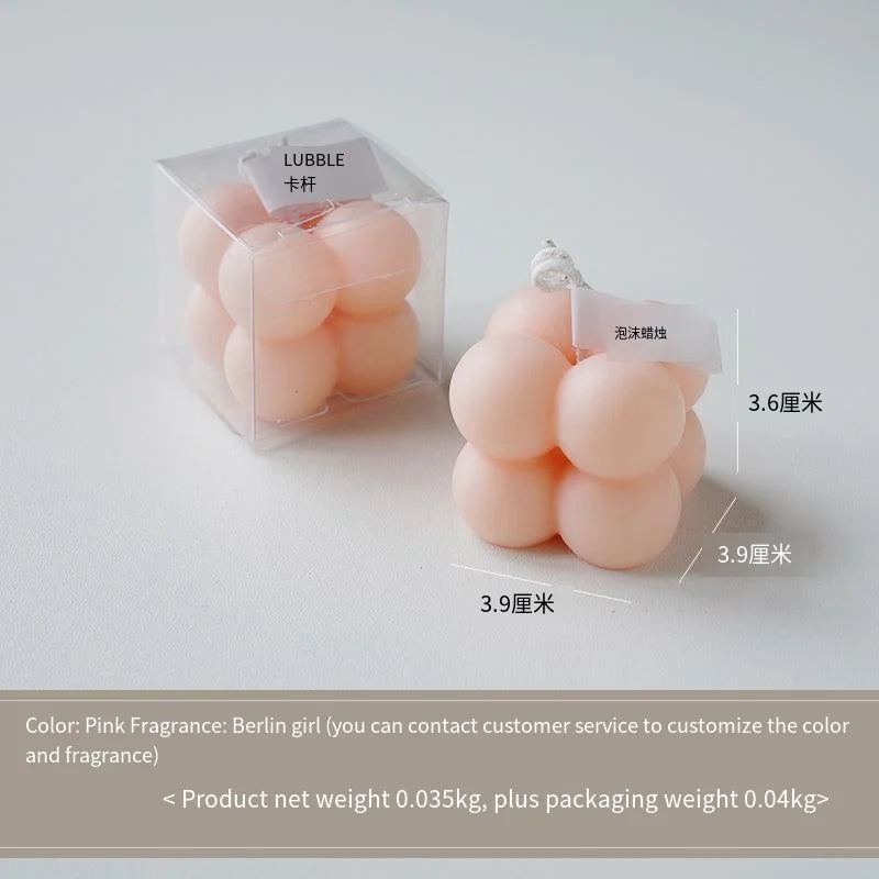 A square ball-shaped scented candle