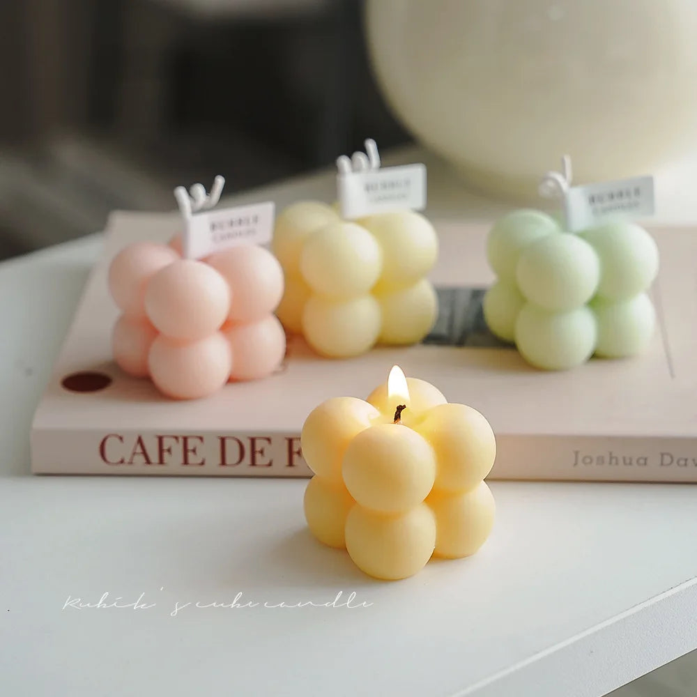 A square ball-shaped scented candle
